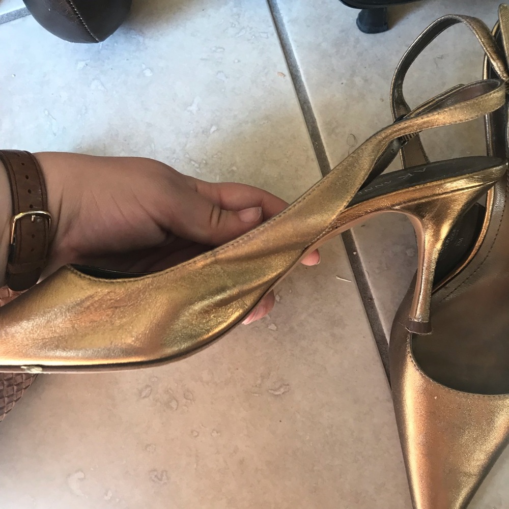 Gold strappy heels by Anne Klein
